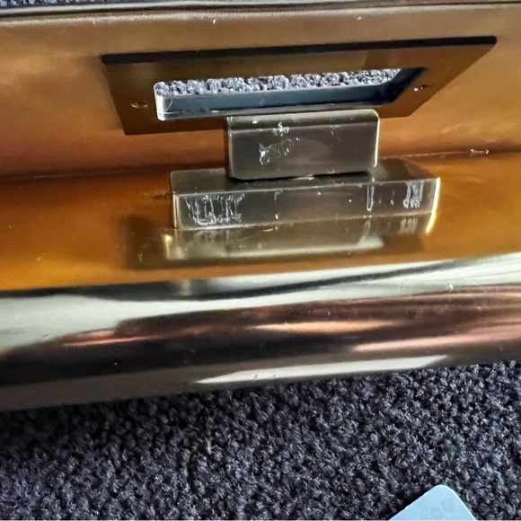 NWT - Olga berg gold clutch bag. NWT. Comes with chain strap. Rectangular clasp. - Picture 8 of 15